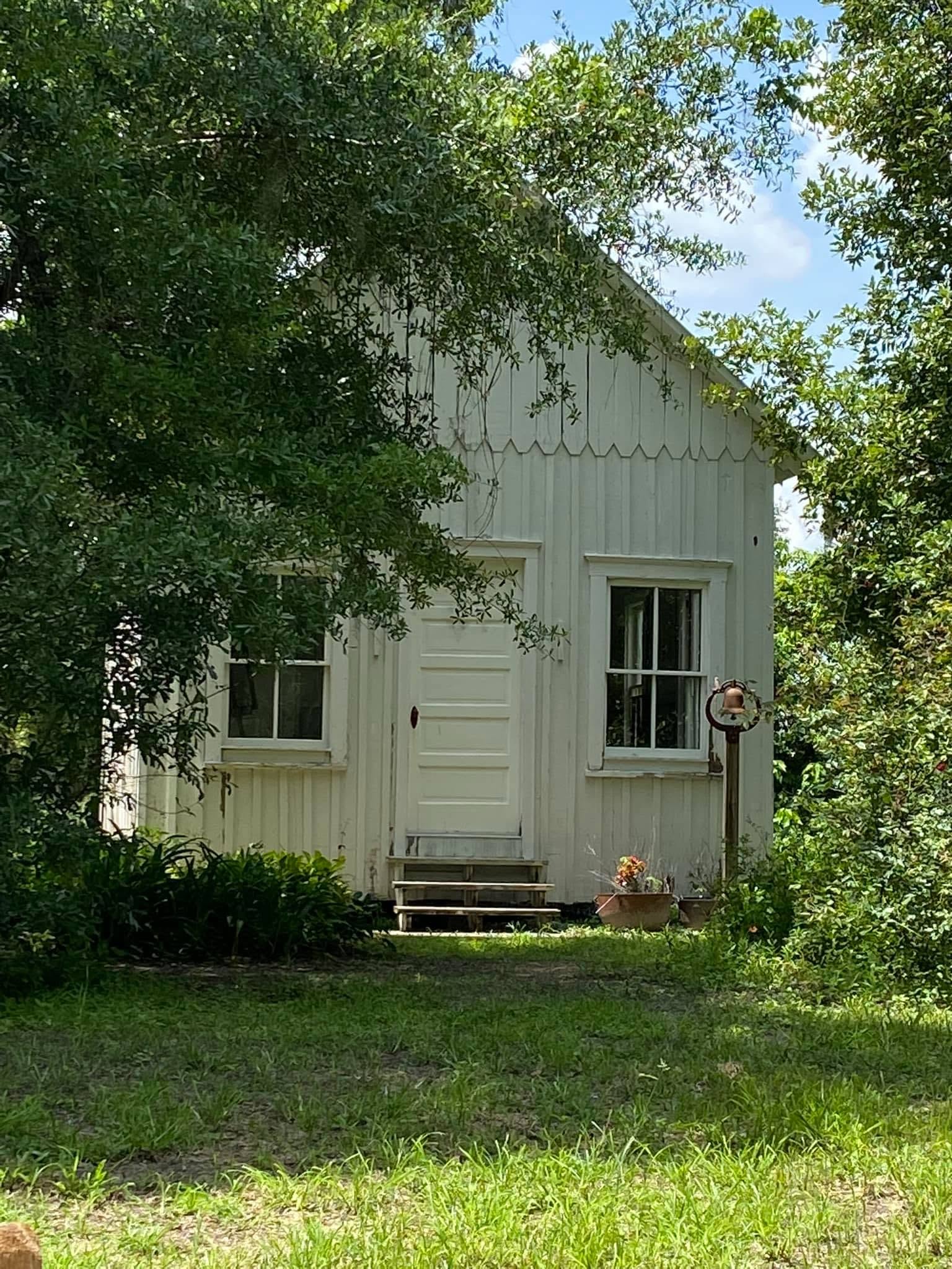 Cottage Behind the Trees